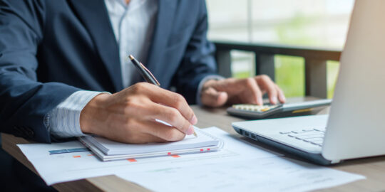 SAP Program manager making written notes